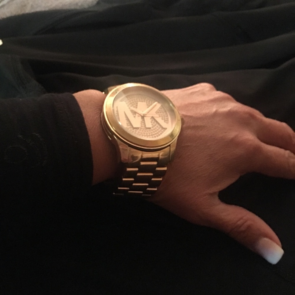 Women’s gold Michel Kors  watch no case